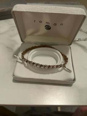 Roman Gold Tone Cubic Zirconia Tennis Bracelet with S-Curve Accents